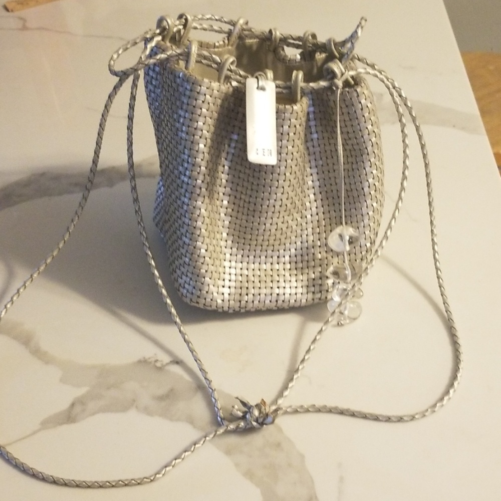 Silver Drawstring CEM woven leather purse.